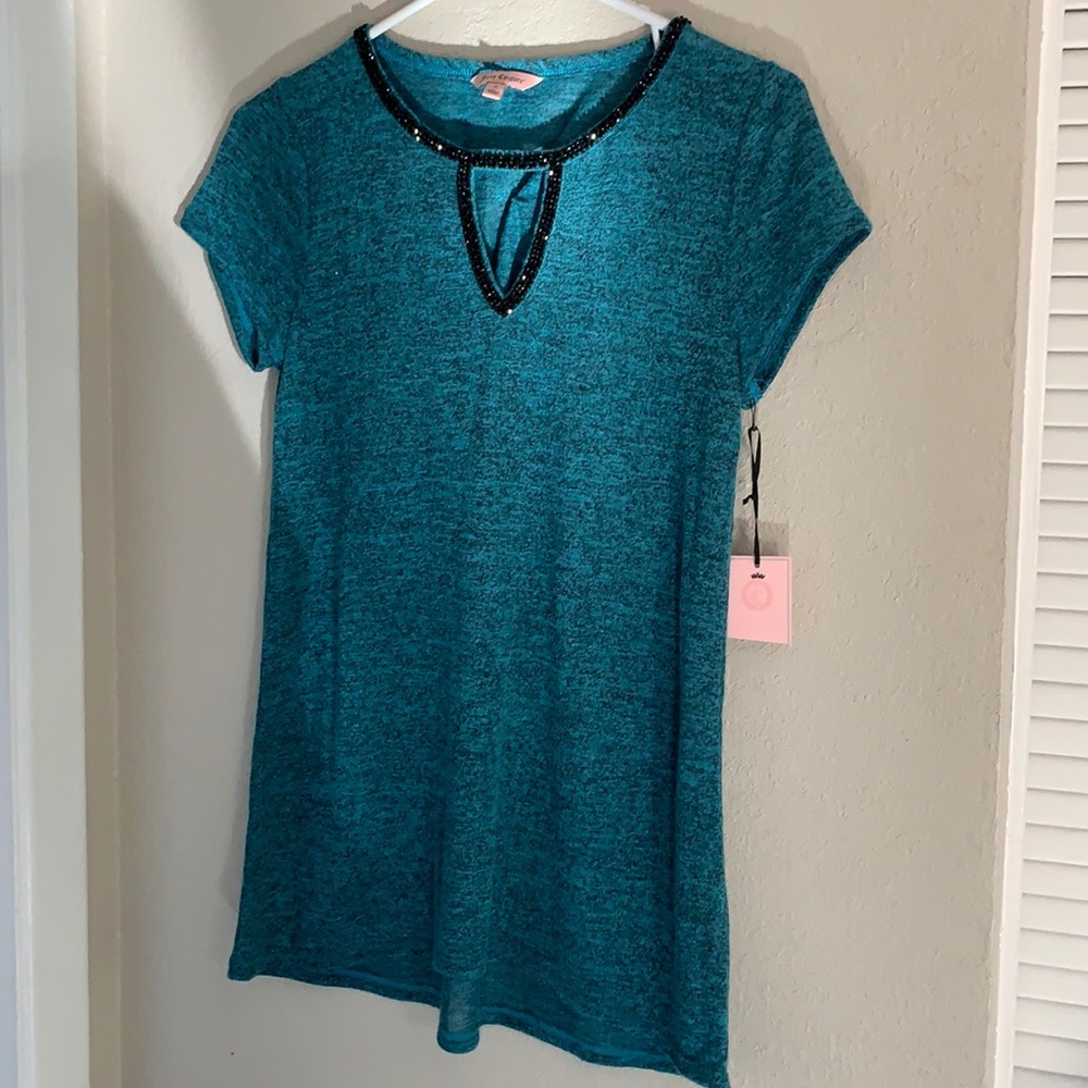 Never worn stretchy short sleeve blouse.